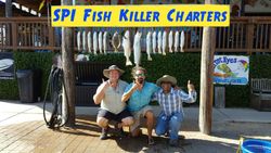 Three anglers enjoying a fishing trip in TX