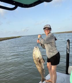 A person fishing in TX