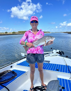 Angler with European seabass catch, TX location