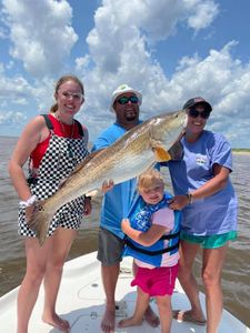 A group of 4 people fishing in GA