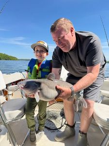 Fishing trip in Accord NY showing caught fish on boat deck