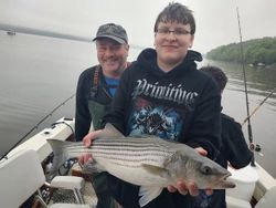 Striped bass catch on fishing boat in Accord NY waters