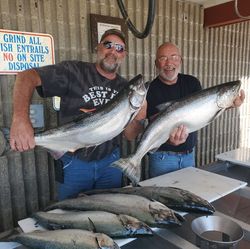 Two anglers fishing for Chinook salmon and Rainbow trout in Sheboygan