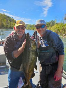 Two people fishing in Cadillac