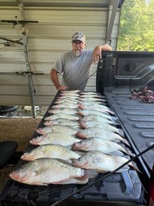 Angler catching two fish in the state of MS