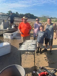 5 people enjoying fishing and hunting in Kingston