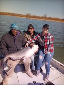 A group of 3 people fishing in Oklahoma