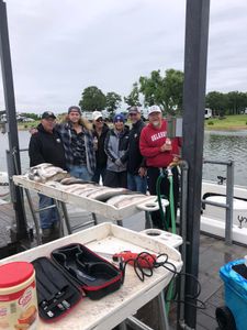 Group of 6 people enjoying outdoor recreational activities in OK.