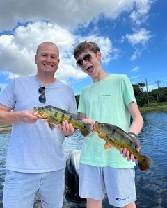Two anglers catching fish in Florida