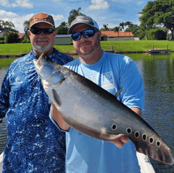 An angler holding a large fish in Florida