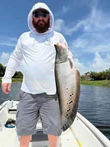 A person fishing at Delray Beach