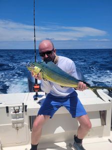 Man fishing in South Carolina with cruises and fishing