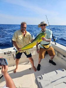 Two people enjoying a fishing cruise on Kiawah Island