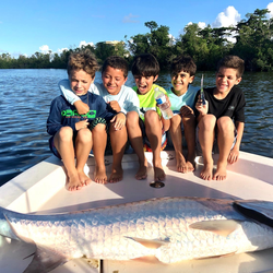 Five people fishing in San Juan
