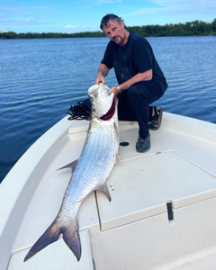 Angler holding a 38-inch fish in PR