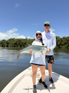 Big Tarpon reeled in during a partly cloudy day at the yacht club!