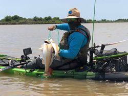 Angler fishing in Crosby