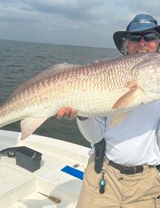 Person holding a 22-inch fish in GA