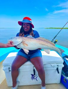 Angler with a 29-inch fish in Darien