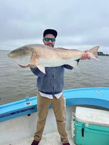 Angler with a 30-inch fish in Darien
