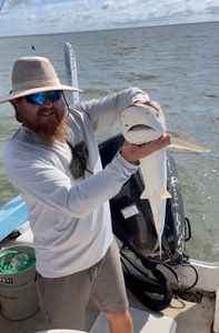 Angler enjoying a day of fishing in Darien