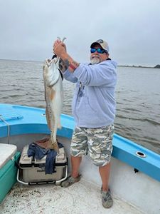 One person fishing in Darien