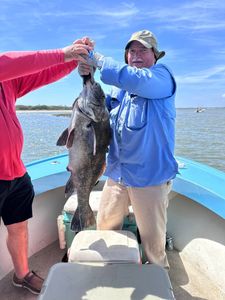 A person fishing in Darien