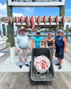 Sun, sea, and a successful Red Snapper catch! 