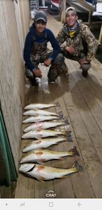 Two anglers fishing on the beach at South Padre Island