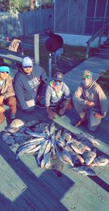 4 people fishing in TX