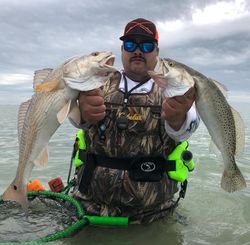 Angler fishing in TX with 2 fish