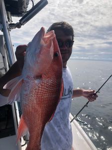 A grey snapper, a 30-inch fish, caught while fishing in St. Marys