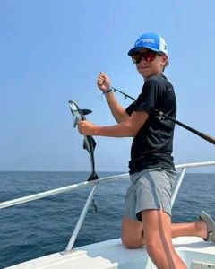 A lone fisherman casts his line in the waters of St. Marys.