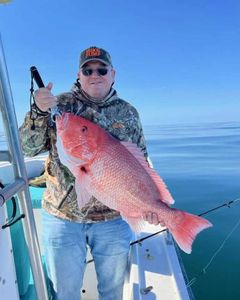 Angler with a 22-inch fish caught at St. Marys