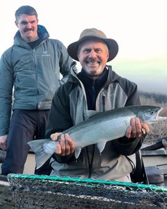 Two people fishing in the beautiful Oregon landscape