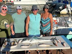 A group of 5 people fishing in Marathon
