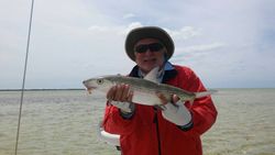 Fisherman with one fish at Freeport