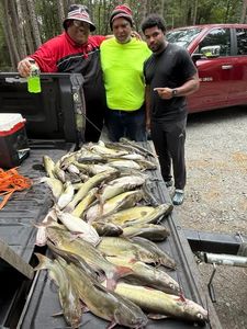 Three people fishing in Kowaliga
