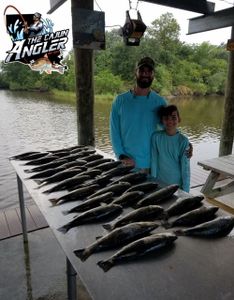 Two people fishing in LA