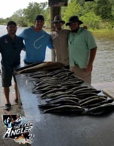 4 people fishing in St Bernard