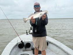 Angler with fish caught on Bolivar Peninsula