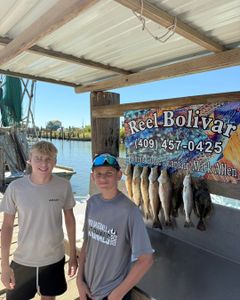 Three redfish caught on the Bolivar Peninsula