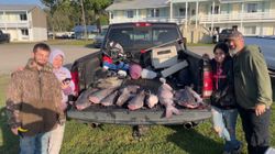 4 people enjoying a fishing trip in SC
