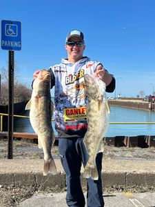 Angler fishing in Ohio with two fish