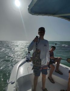 Anglers enjoying a fishing cruises, fishing, and tours adventure in FL