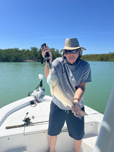 Peaceful day on the water reeling in the catch.