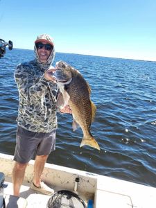 Angler with a big catch at Santa Rosa Beach