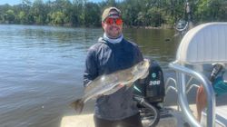 Angler with a 18-inch fish at Santa Rosa Beach