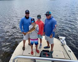 4 people fishing at Santa Rosa Beach