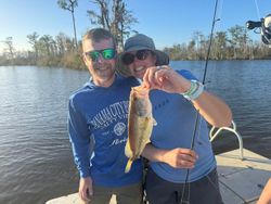 Two people fishing at Santa Rosa Beach